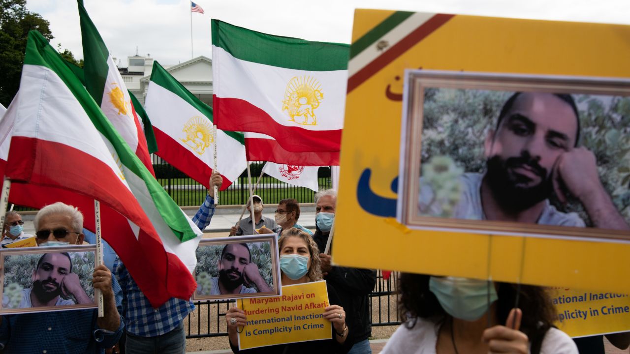 Iranian-American supporters of the National Council of Resistance of Iran (NCRI) protest the execution of wrestler Navid Afkari by Iran, in front of the White House in Washington, D.C. in September 2020. 