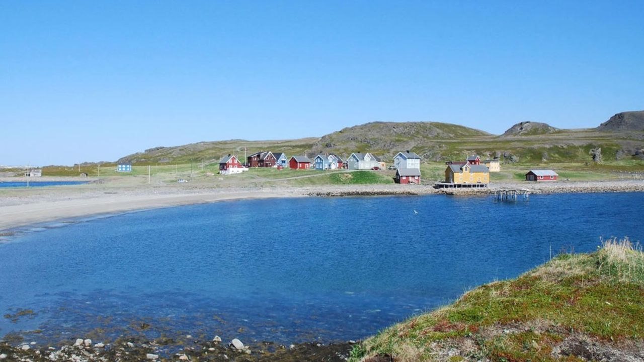 Kongsfjord in summer, minus the snow.