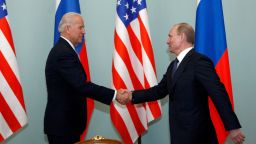 Biden shakes hands with Putin in Moscow on March 10, 2011.