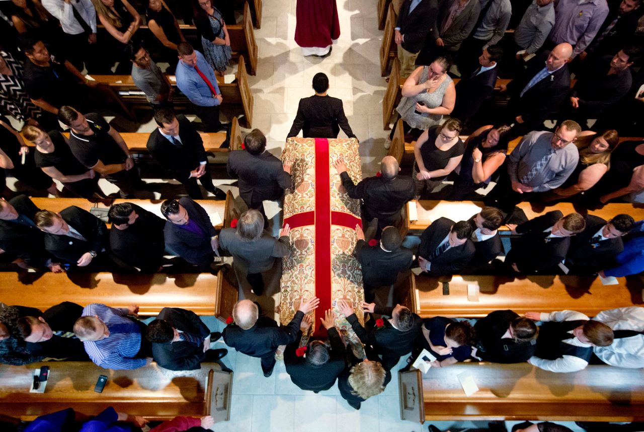 The casket of Pulse victim Christopher Andrew Leinonen enters the Cathedral Church of St. Luke for his funeral service on June 18, 2016.