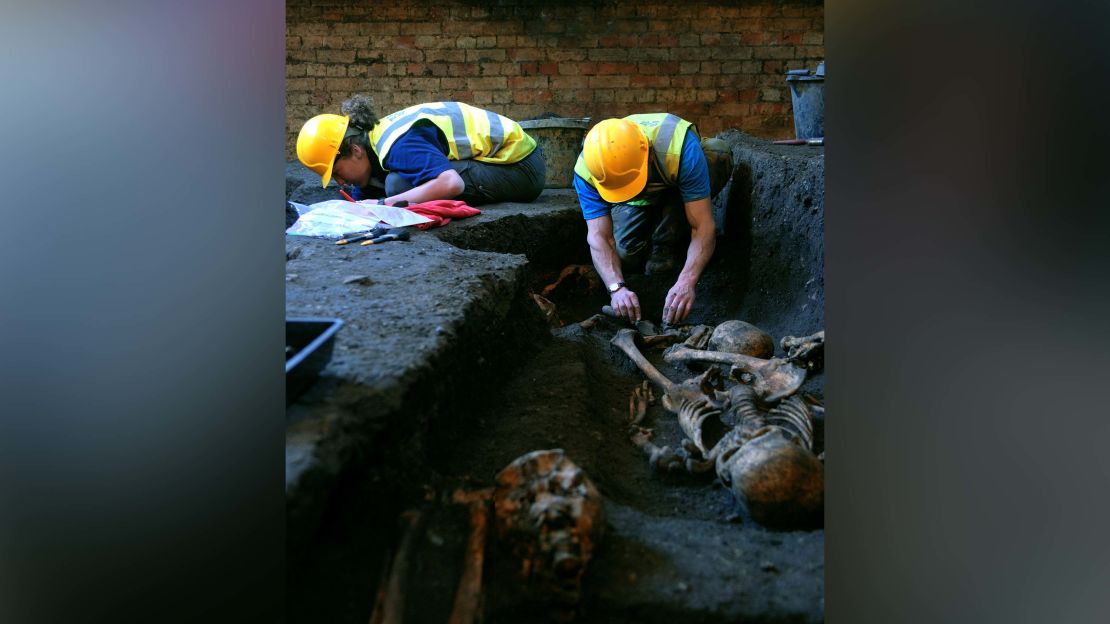 Members of the Cambridge Archaeological Unit at work on the excavation of skeletons in 2010.  