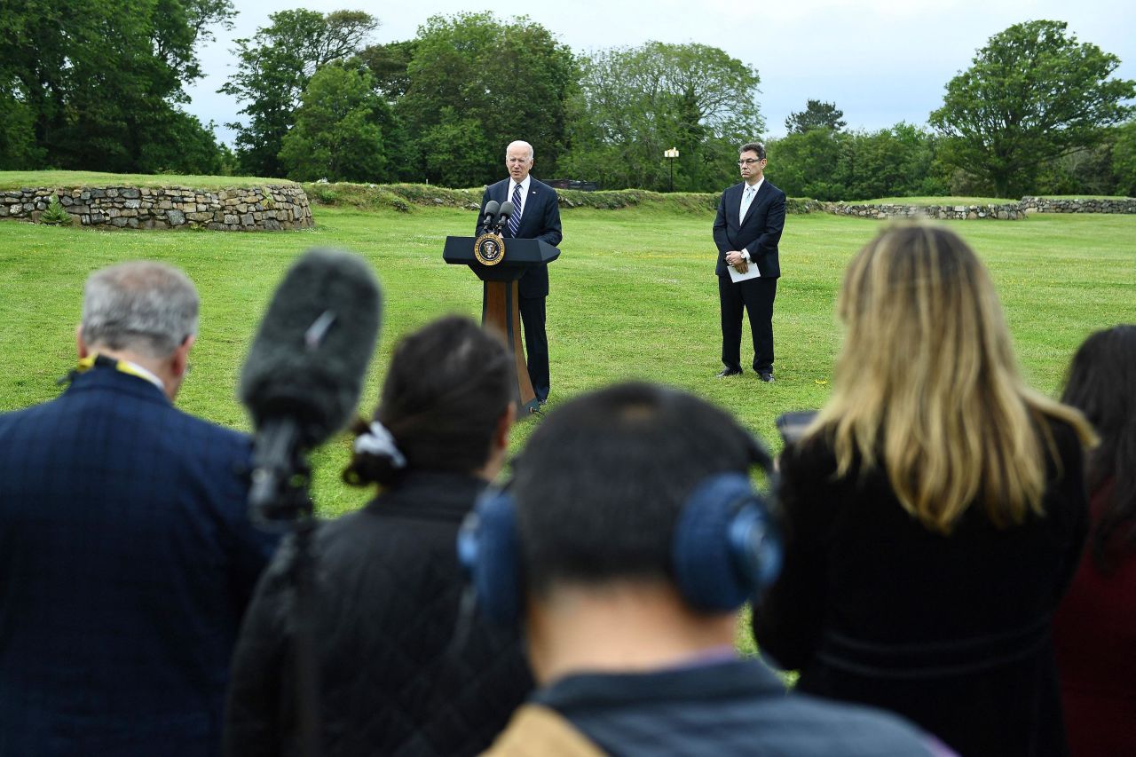 Biden delivers a speech about Covid-19 as Pfizer CEO Albert Bourla stands alongside him Thursday in St. Ives, England. Biden announced that the United States <a href="https://www.cnn.com/2021/06/10/politics/joe-biden-vaccine-us-leadership/index.html" target="_blank">plans to donate 500 million doses of Pfizer's Covid-19 vaccine globally</a> as part of his efforts to reassert US leadership on the world stage.