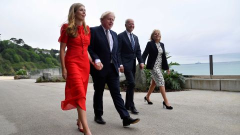 The Bidens walk with Johnson and his wife, Carrie, outside Carbis Bay on Thursday. The Johnsons <a href="https://www.cnn.com/2021/05/29/world/boris-johnson-marries-carrie-symonds-intl/index.html" target="_blank">were married last month.</a>