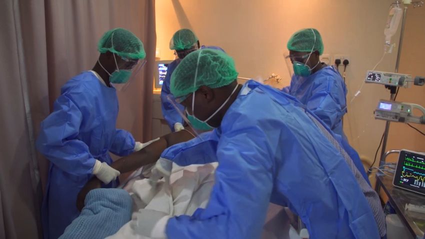 Covid-19 cases in Uganda were up 137% this week, the second straight week of a triple-digit spike in infections. The rapid surge in Uganda's brutal second wave has forced the country back into a partial lockdown to curb the spread. CNN's Larry Madowo reports from Kampala, Uganda.