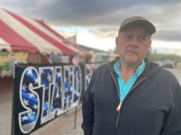 Local farmer Dan Nielsen stands outside the tent set up next to the main headgate called "A" Canal in Klamath Falls, Oregon.