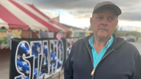 Local farmer Dan Nielsen stands outside the tent set up next to the main headgate called "A" Canal in Klamath Falls, Oregon.