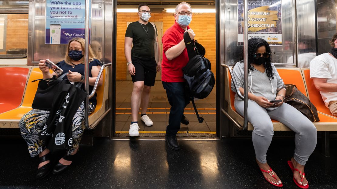 People ride the subway in New York City on May 26.