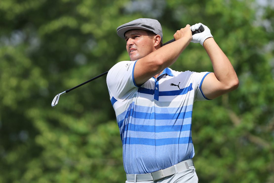 DeChambeau plays his shot from the 14th tee during the first round of The Memorial Tournament.