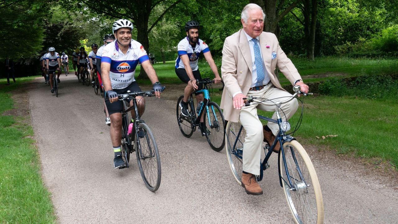 It's the Prince of Wheels (come on, let us have that one). Sorry, obviously we mean the Prince of Wales, who hopped on a bike with members of the British Asian Trust for a short ride to kick off the charity's "Palace on Wheels" cycling event at Highgrove on Thursday in Tetbury, England.