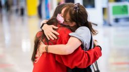  A mother and daughter embrace after 10 months without seeing each other, at Adolfo Suarez Madrid-Barajas Airport, on 7 June, 2021 in Madrid, Spain. 