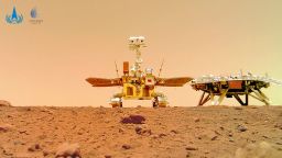 China National Space Administration (CNSA) released images of its Mars mission. This image was taken by a separable camera deployed by the Zhurong rover, showing the rover and the lander on the surface of Mars.