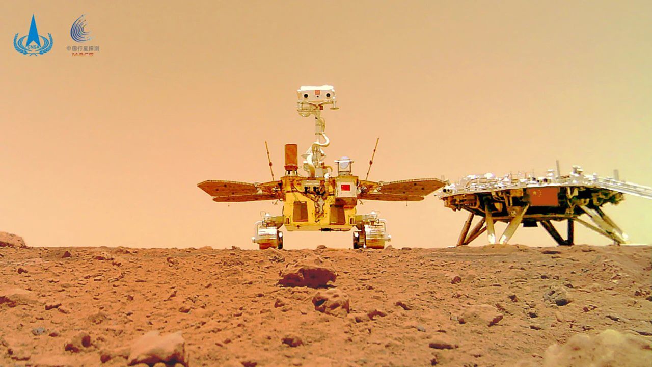 China's Zhurong rover (center) explores the surface of Mars.