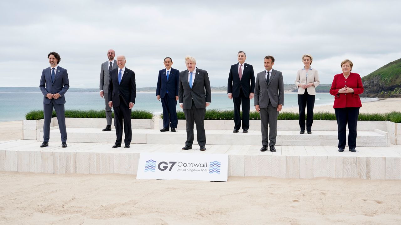 Leaders of the G7 pose for a group photo on overlooking the beach at the Carbis Bay Hotel in Carbis Bay, St. Ives, Cornwall, England, Friday, June 11, 2021. Leaders from left, Canadian Prime Minister Justin Trudeau, European Council President Charles Michel, U.S. President Joe Biden, Japan's Prime Minister Yoshihide Suga, British Prime Minister Boris Johnson, Italy's Prime Minister Mario Draghi, French President Emmanuel Macron, European Commission President Ursula von der Leyen and German Chancellor Angela Merkel. (AP Photo/Patrick Semansky, Pool)