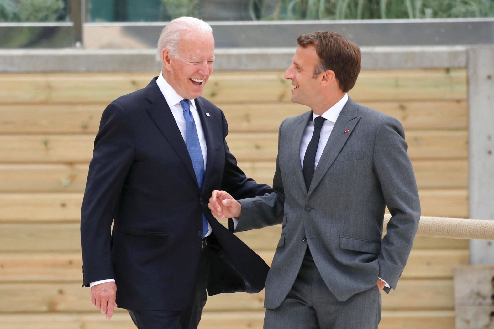 Biden and French President Emmanuel Macron walk along the boardwalk during the G7 summit on Friday. <a href="index.php?page=&url=https%3A%2F%2Fwww.cnn.com%2F2021%2F06%2F12%2Fpolitics%2Fbiden-macron-bilateral-g7%2Findex.html" target="_blank">They met for a more formal meeting on Saturday</a> and discussed a number of issues. "We have to deal with this pandemic and the Covid-19. We have to face a lot of challenges, a lot of crises, climate change, and for all these issues, what we need is cooperation, and I think it's great to have a US President part of the club and very willing to cooperate," Macron said.