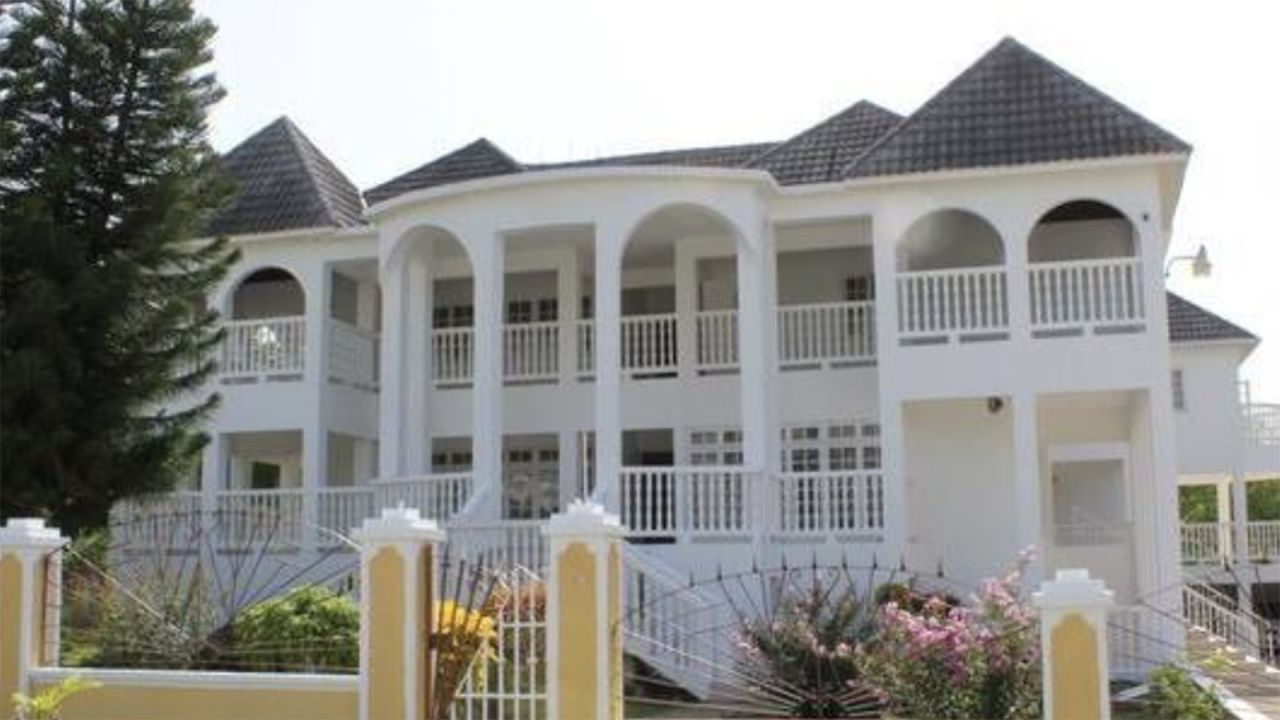 Boasting 11 bedrooms, this Jamaica mansion is 15 minutes from James Bond Beach. 