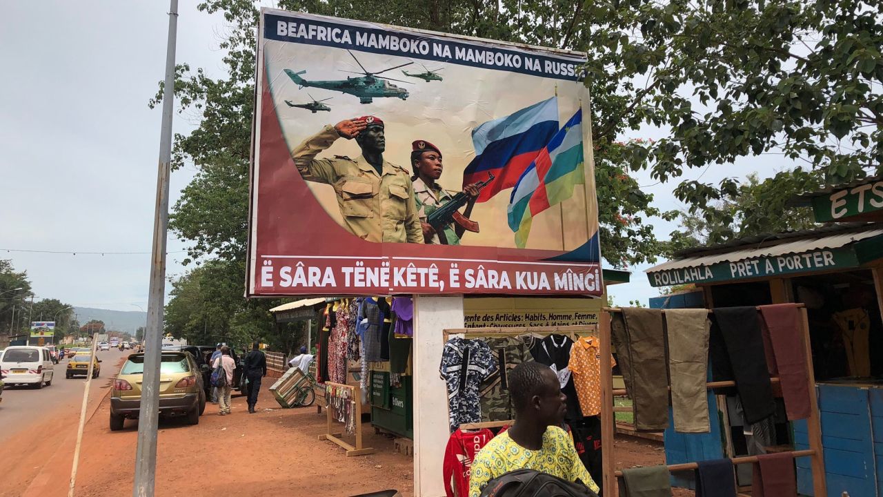 A billboard with Russian propaganda is seen in Bangui. The message reads: "Russia hand in hand with the Central African Republic, talk a little, work a lot."