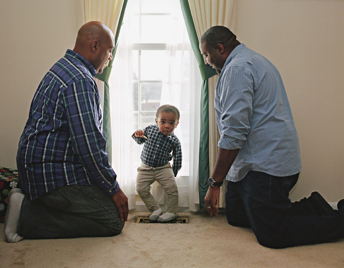 "I think that this (book) is going to hopefully help change the image of fathering," said Charles Barksdale, pictured here with husband DaRel and son Braeden.
