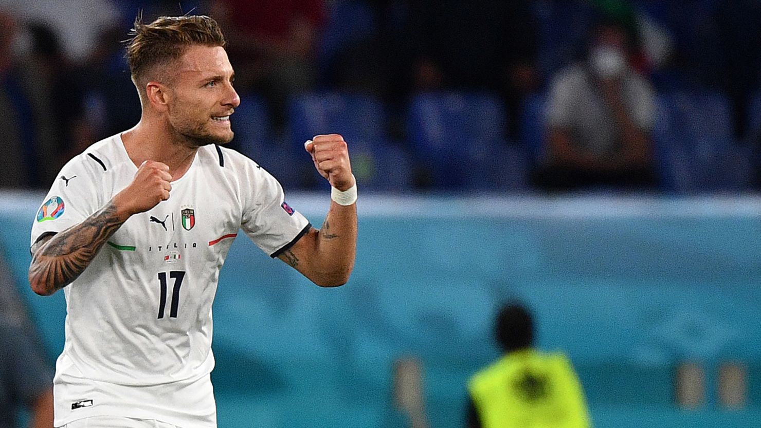 Ciro Immobile celebrates after scoring Italy's second goal against Turkey.