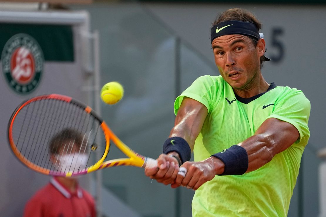 Spain's Rafael Nadal sends a backhand to Serbia's Novak Djokovic during their French Open semifinal.