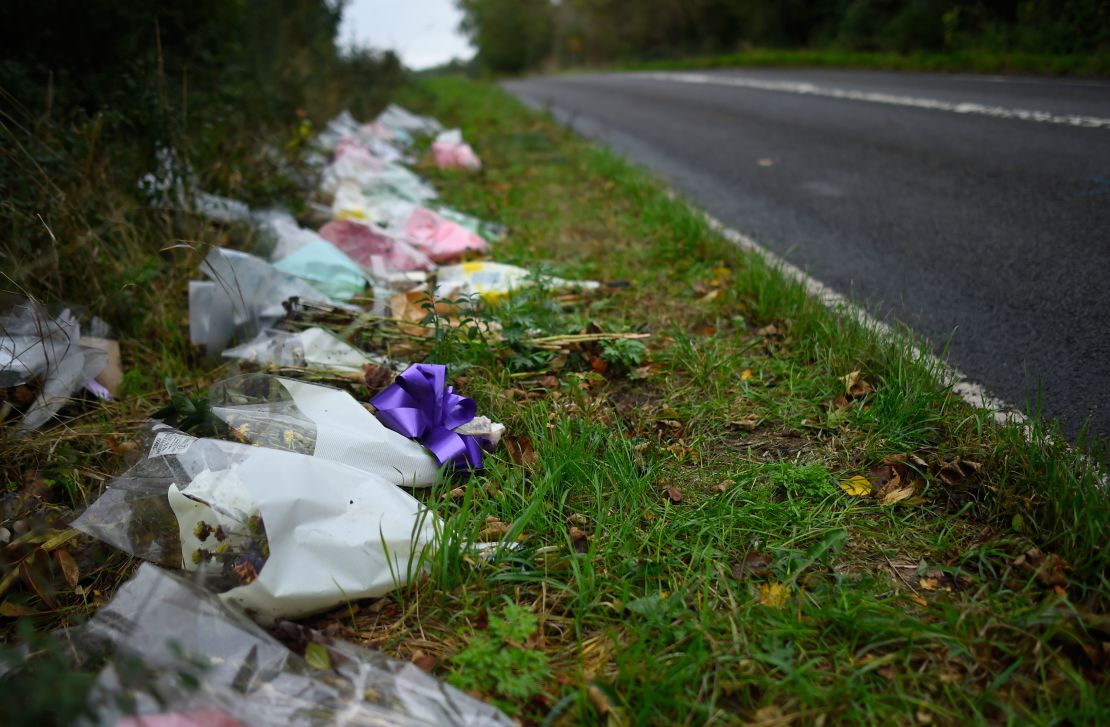 Flowers left in remembrance of Harry Dunn on the B4031 road near RAF Croughton in 2019.