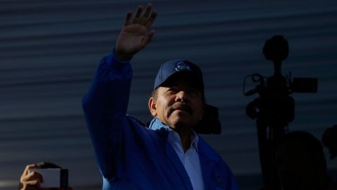 Nicaraguan President Daniel Ortega waves to supporters during a rally in Managua on August 22, 2018.