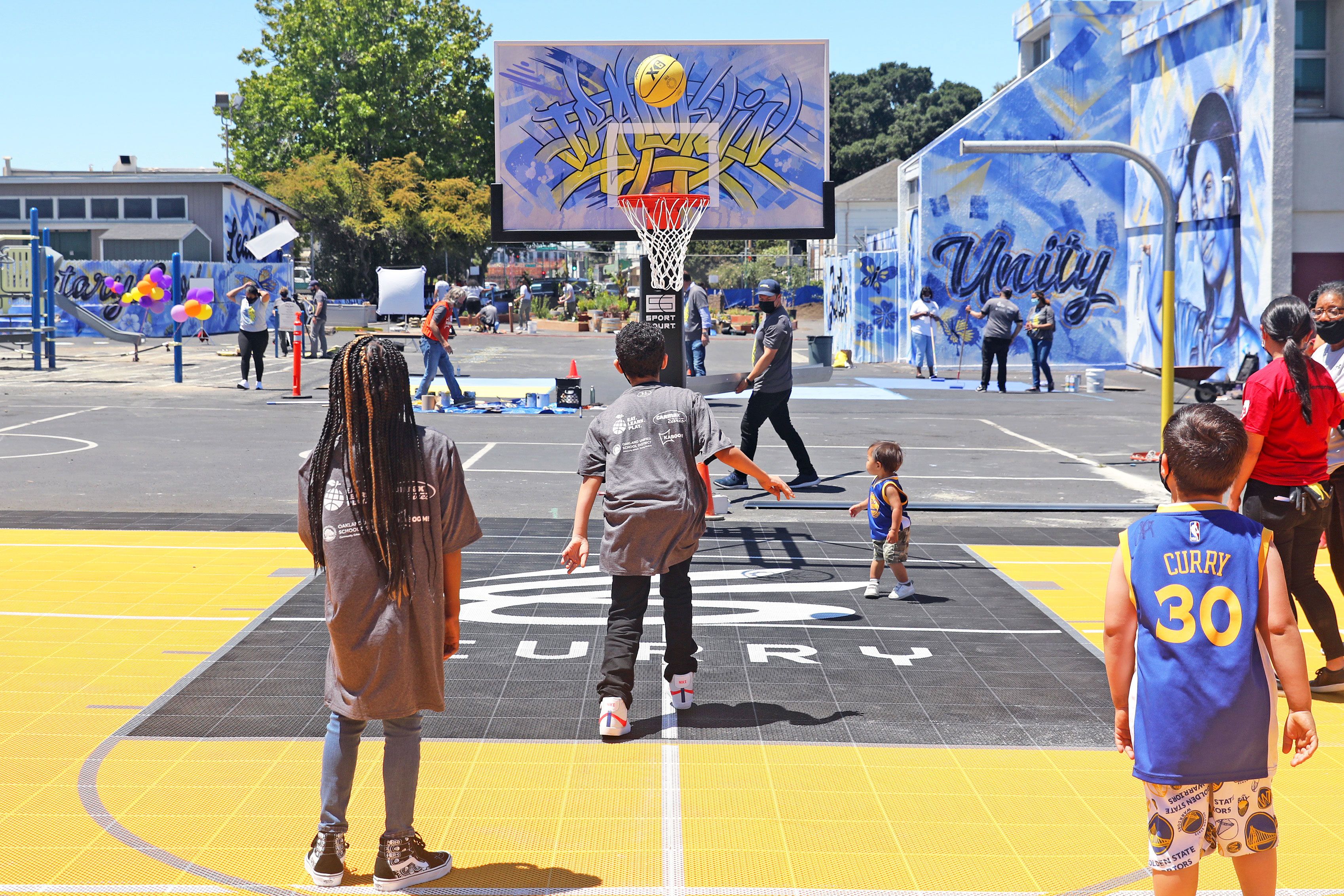 Steph and Ayesha Curry help remodel an Oakland elementary school playground | CNN