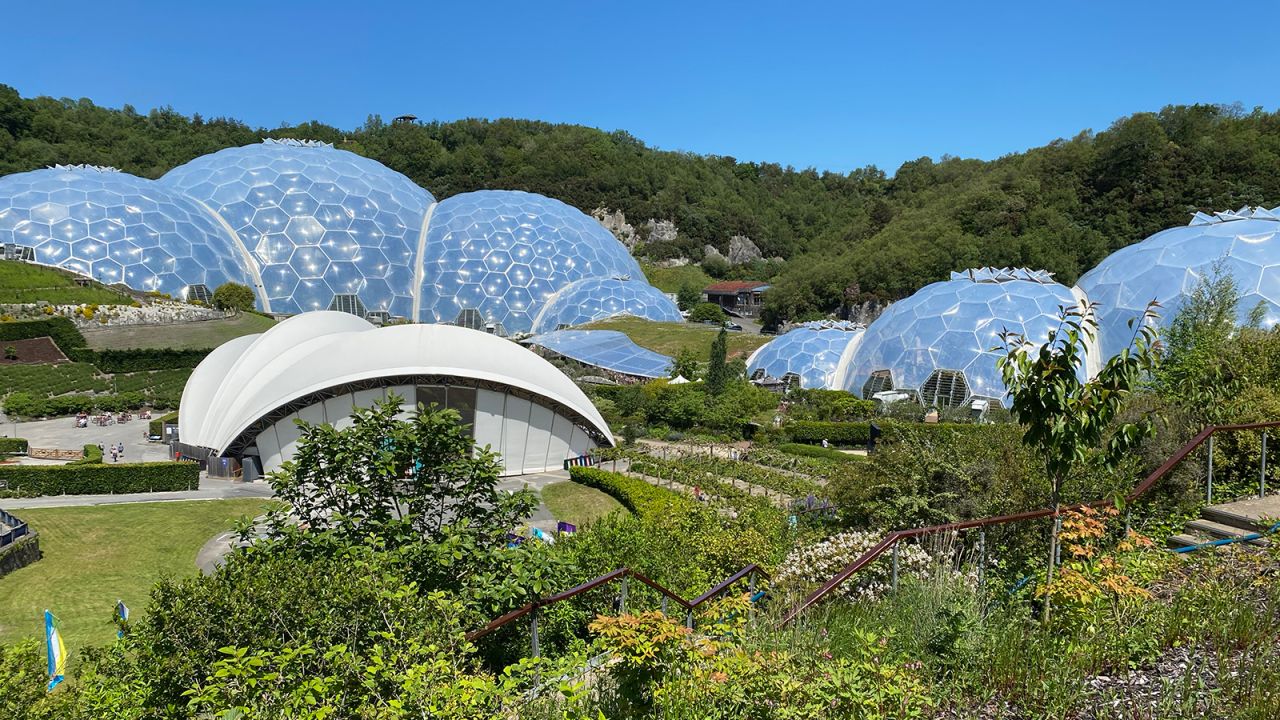 The Eden Project houses biomes under adjoining domes.