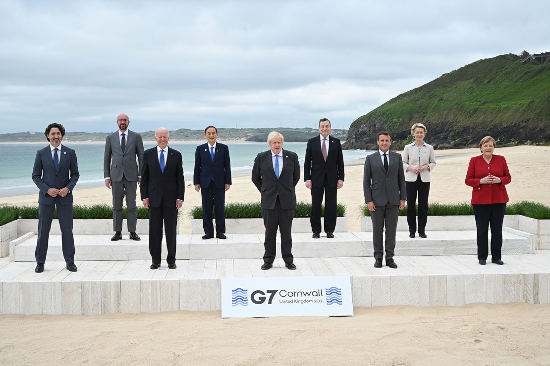 (L-R) Canadian Prime Minister Justin Trudeau, President of the European Council Charles Michel, US President Joe Biden, Japanese Prime Minister Yoshihide Suga, British Prime Minister Boris Johnson, Italian Prime Minister Mario Draghi, French President Emmanuel Macron, President of the European Commission Ursula von der Leyen and German Chancellor Angela Merkel, pose for the leaders official welcome during the G7 summit in Carbis Bay.