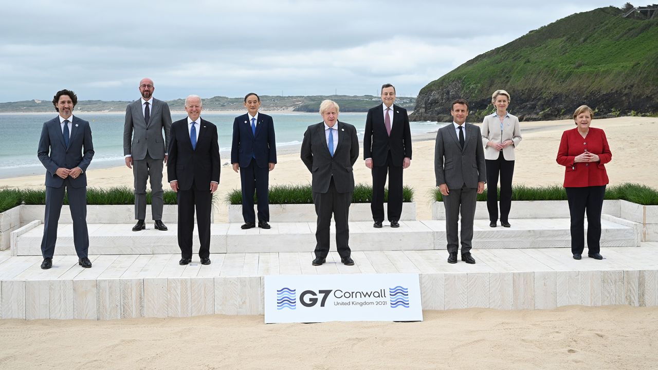 (L-R) Canadian Prime Minister Justin Trudeau, President of the European Council Charles Michel, US President Joe Biden, Japanese Prime Minister Yoshihide Suga, British Prime Minister Boris Johnson, Italian Prime Minister Mario Draghi, French President Emmanuel Macron, President of the European Commission Ursula von der Leyen and German Chancellor Angela Merkel, pose for the leaders official welcome during the G7 summit in Carbis Bay.