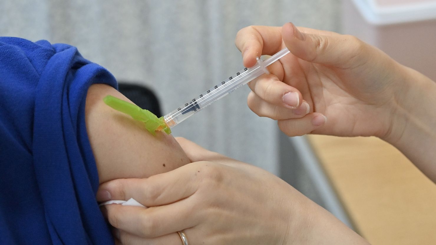 A medical worker receives the Pfizer-BioNTech Covid-19 vaccine in Seoul, South Korea, on March 20.