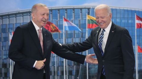 Turkish President Recep Tayyip Erdogan (L) greets US President Joe Biden (R) at the NATO summit at the North Atlantic Treaty Organization headquarters in Brussels, on June 14, 2021.