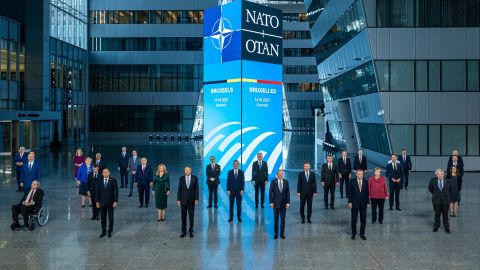 Biden and other world leaders pose for a group photo at the NATO summit.
