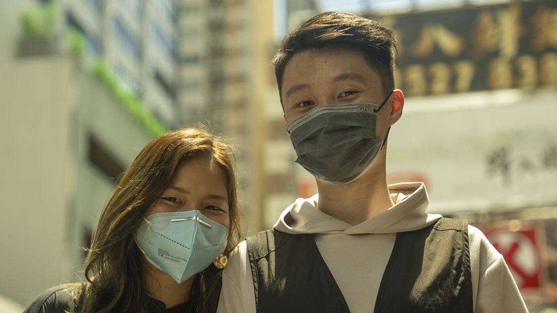 The couple goes for a walk in Hong Kong's Mong Kok neighborhood.