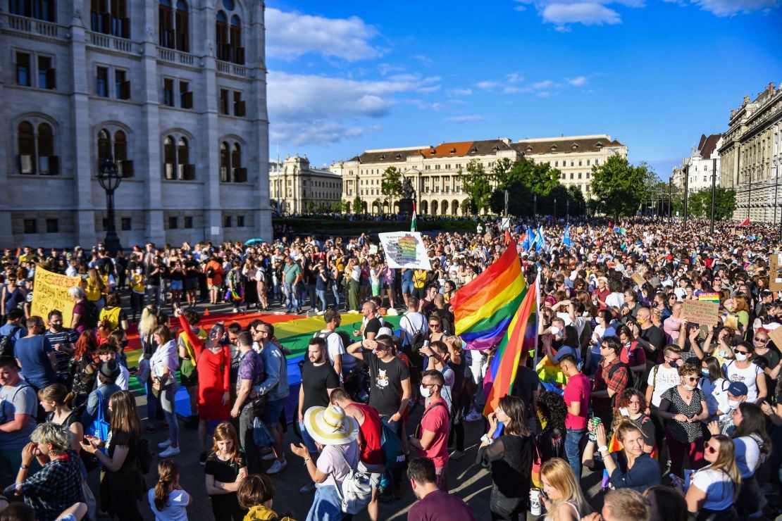 Participants gather near parliament in Budapest on June 14, 2021, during a demonstration against the Hungarian government's draft bill seeking to ban the "promotion" of homosexuality in schools.