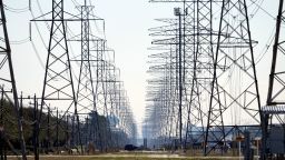 FILE - This Tuesday, Feb. 16, 2021 file photo shows power lines in Houston. The electric power grid manager for most of Texas has issued its first conservation alert of the summer, calling on users to dial back energy consumption to avert an emergency. The Energy Reliability Council of Texas issued the alert shortly after midday Monday, saying many forced generation outages and potential record June demand is squeezing the power supply. (AP Photo/David J. Phillip)