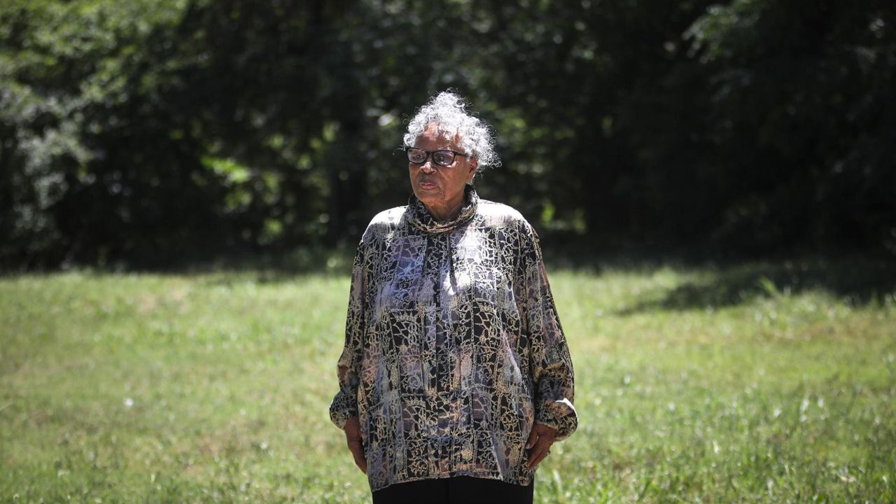 Opal Lee, 93, stands in front of the lot where in 1939 White rioters attacked, invaded and burned her family's home.