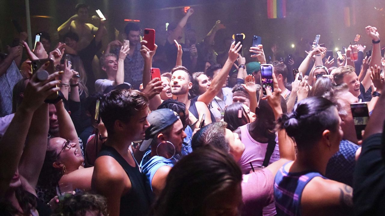 Patrons cheer during a "Countdown To Reopening" party at The Abbey on June 15, 2021, in West Hollywood, California. 