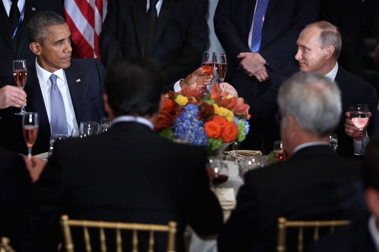Obama and Putin <a href="https://www.cnn.com/2015/09/28/politics/barack-obama-vladimir-putin-cheers-toast/index.html" target="_blank">share a toast</a> during a UN luncheon in 2015. The two leaders, bitterly at odds over Ukraine and Syria, held one-on-one talks later in the day.