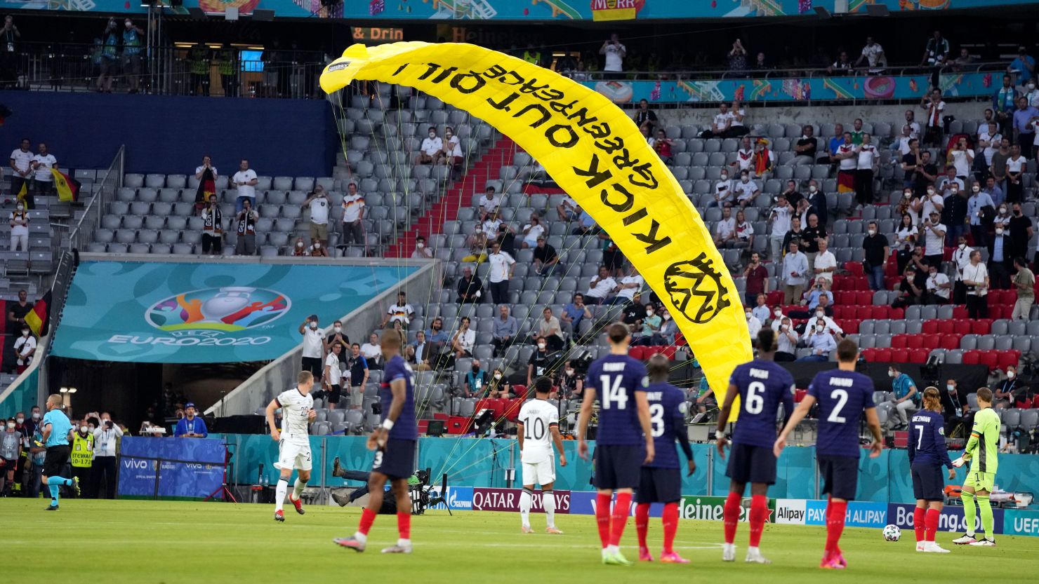 A protester parachuted onto the pitch before the Euro 2020 game between France and Germany.
