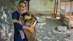 Dr. Hamida with Ragnar, one of 1,600 dogs Nowzad has helped reunite with soldiers who rescued them since 2006. The group does not use surnames of Afghani staff to protect their families.