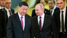 FILE - In this June 5, 2019, file photo, Russian President Vladimir Putin, center right, and Chinese President Xi Jinping, center left, enter a hall for talks in the Kremlin in Moscow, Russia. Putin and Xi have developed strong personal ties helping bolster a "strategic partnership" between the two former Communist rivals. (AP Photo/Alexander Zemlianichenko, Pool, File)