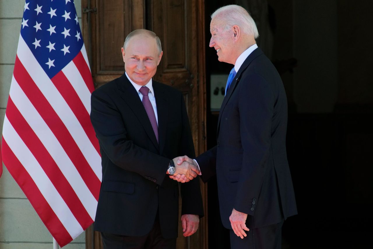 Putin shakes hands with US President Joe Biden <a href="http://www.cnn.com/2021/06/16/politics/gallery/biden-putin-summit/index.html" target="_blank">as they met</a> in Geneva, Switzerland, on Wednesday, June 16. 