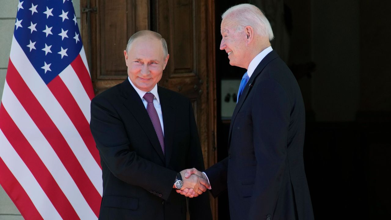 Russian President Vladimir Putin, left, and U.S President Joe Biden shake hands during their meeting at the 'Villa la Grange' in Geneva, Switzerland in Geneva, Switzerland, Wednesday, June 16, 2021. 