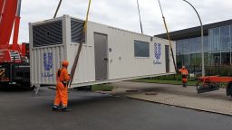 Unilever's latest factory getting into position in Wageningen, Netherlands. Unilever is developing a fully functioning production line inside a 40-foot shipping container. 