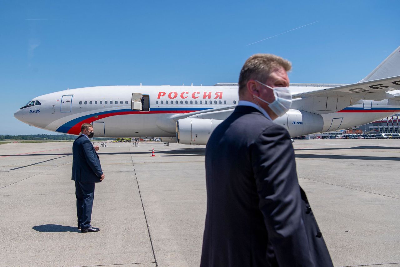 Putin's plane lands in Geneva.