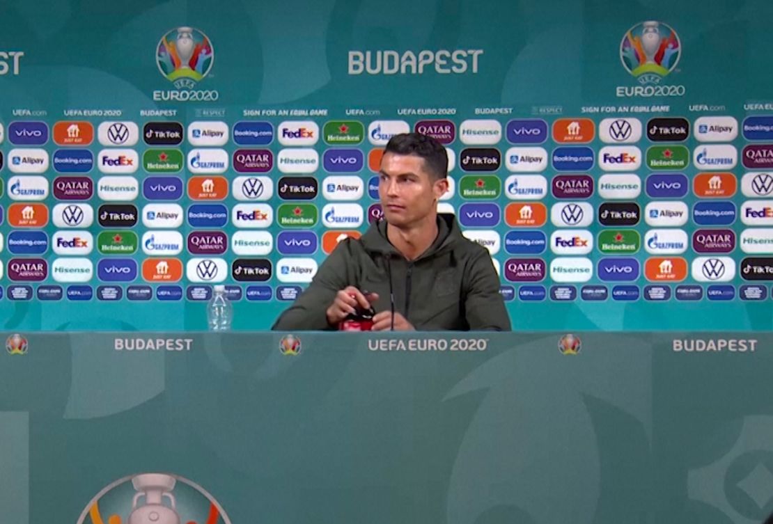 Ronaldo didn't appear to be happy with the two Coca-Cola bottles on display during his press conference. 