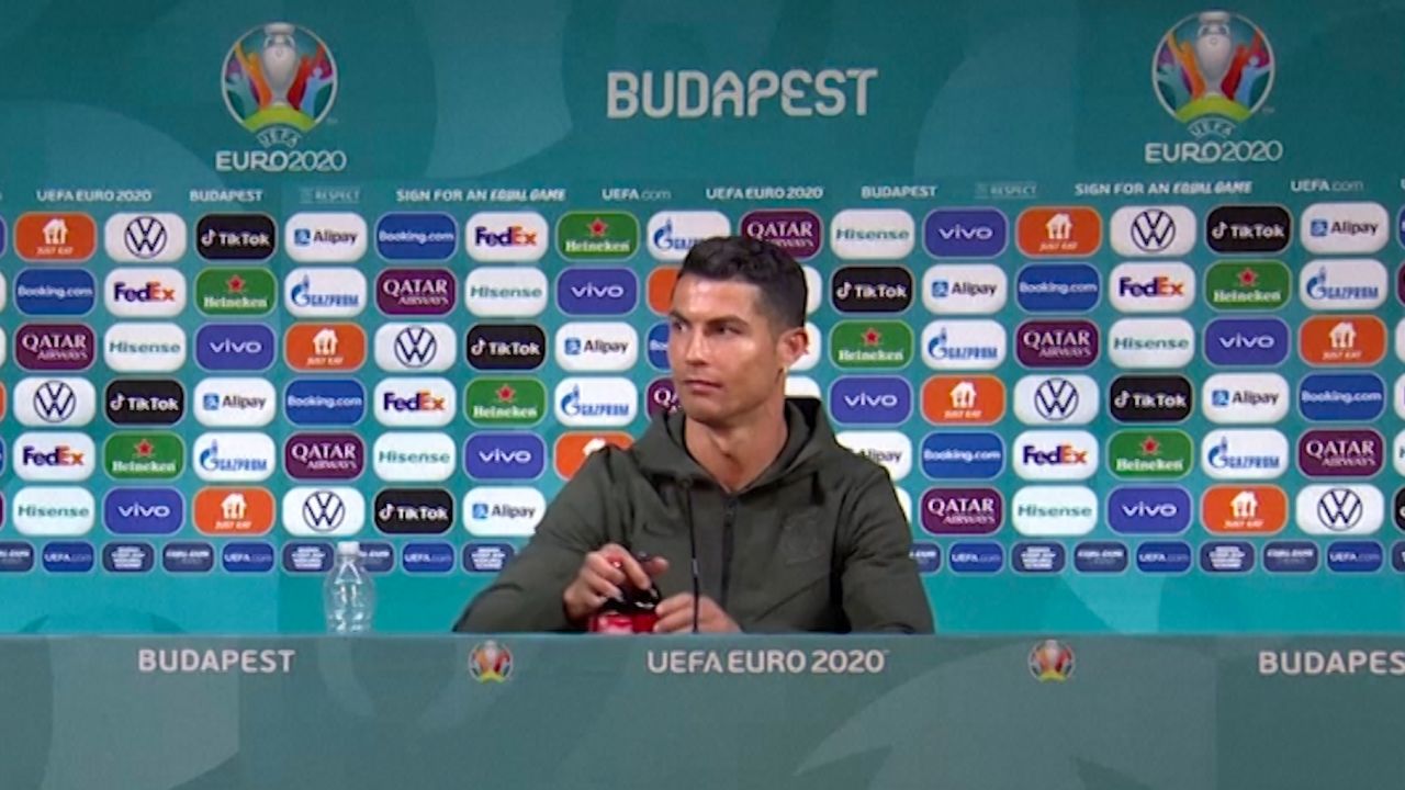 Ronaldo didn't appear to be happy with the two Coca-Cola bottles on display during his press conference.