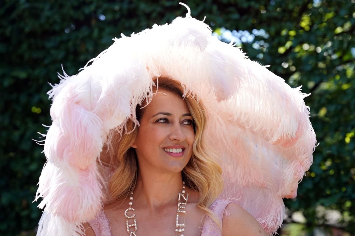 One guest arrives in a canopy of feathers.