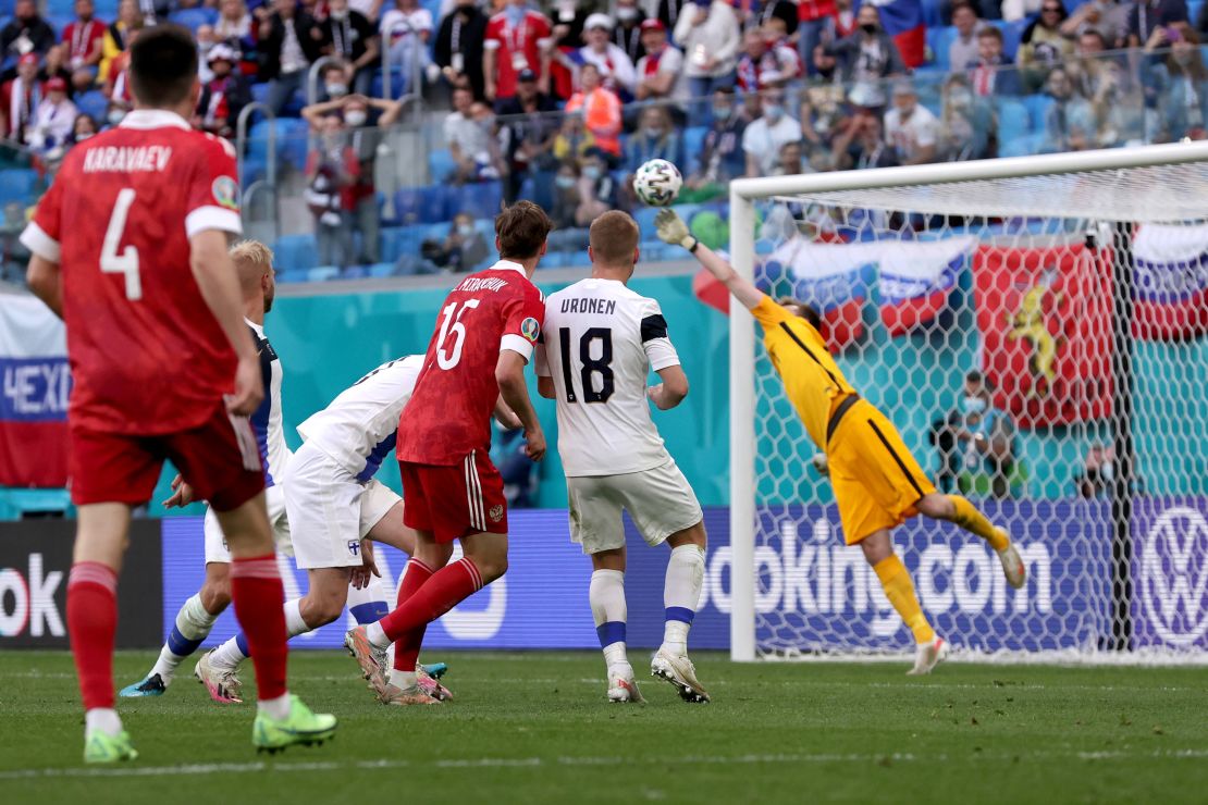 Aleksei Miranchuk of Russia scores their side's winner against Finland.