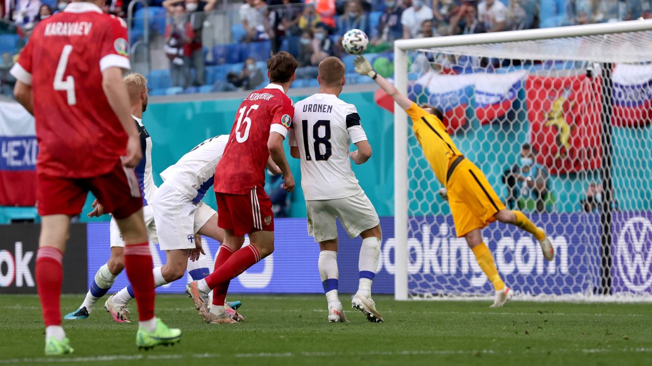 Aleksei Miranchuk of Russia scores their side's winner against Finland.